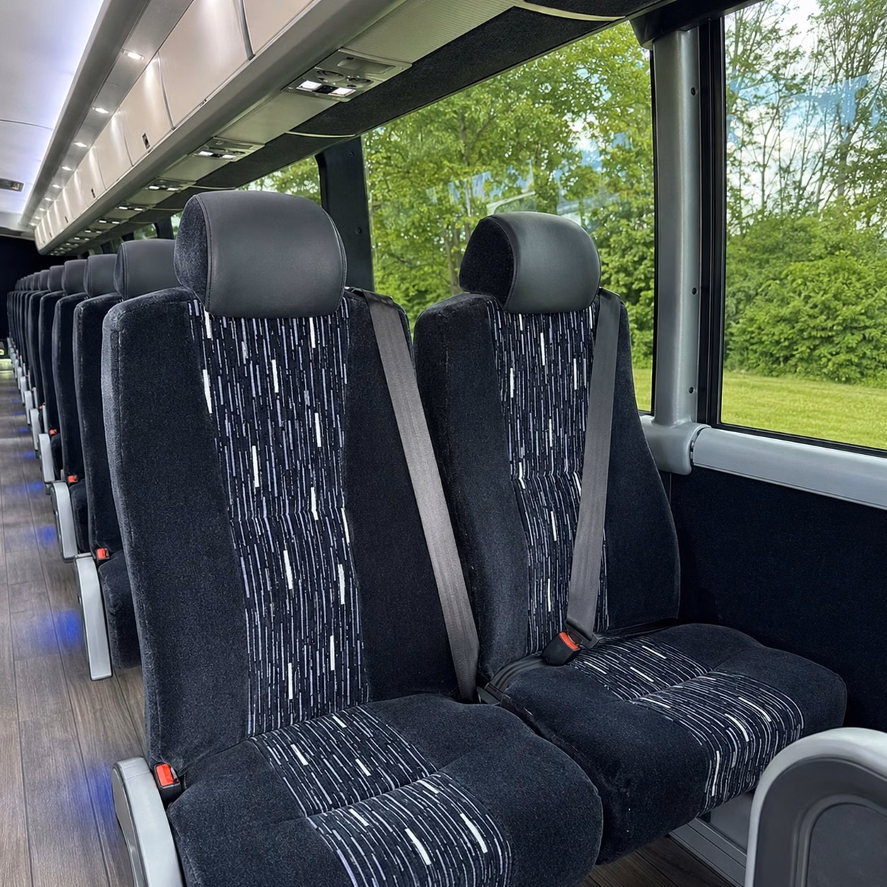 how bus type and size change charter bus prices in cambridge massachusetts